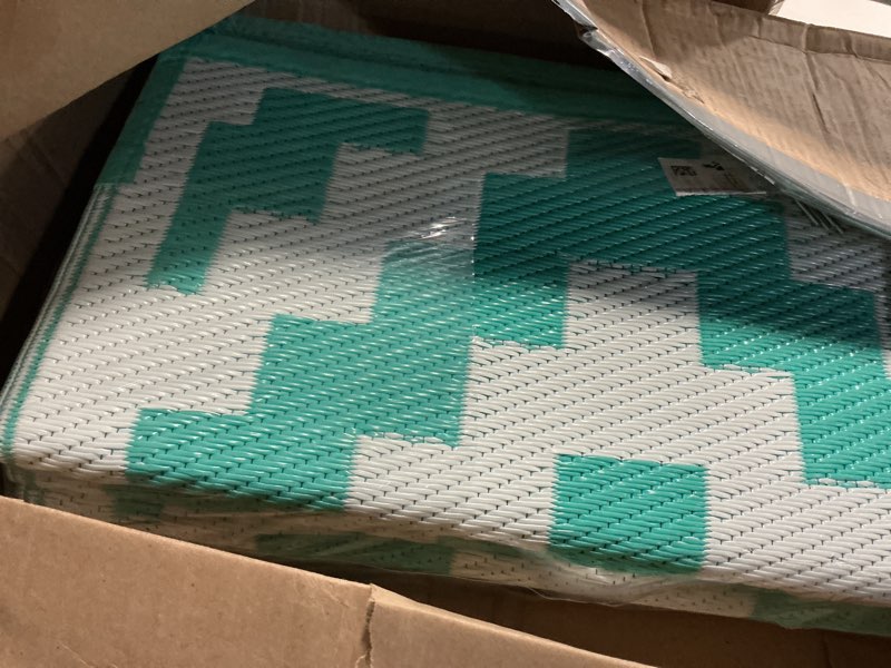Condition photo showing Good Condition for smiry waterproof outdoor rug 4x6 ft, reversible plastic straw patio camping rugs, outdoor indoor rv mat carpet for patio, outside entry, backyard, deck, bench, picnic, camper, white & teal white and teal 4' x 6' (rectangular)