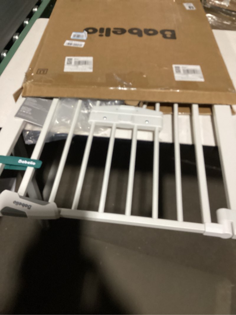 Condition photo showing As Is for BABELIO New Version Baby Gate with Cat Door Adjustable,29-40" Metal Pet Door for Stairs & Doorways,Pressure Mounted,No Tools Needed,White White 29-40" Wide, 30" Tall