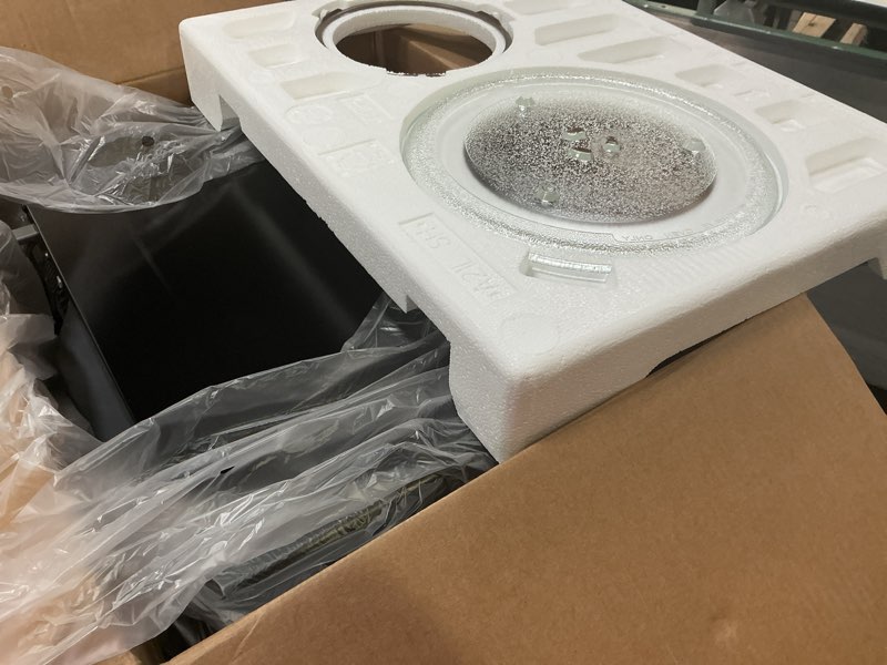 Condition photo showing Good Condition for farberware countertop microwave 900 watts, 0.9 cu ft - microwave oven with led lighting and child lock - perfect for apartments and dorms - easy clean brushed stainless steel 0.9 cu. ft brushed stainless