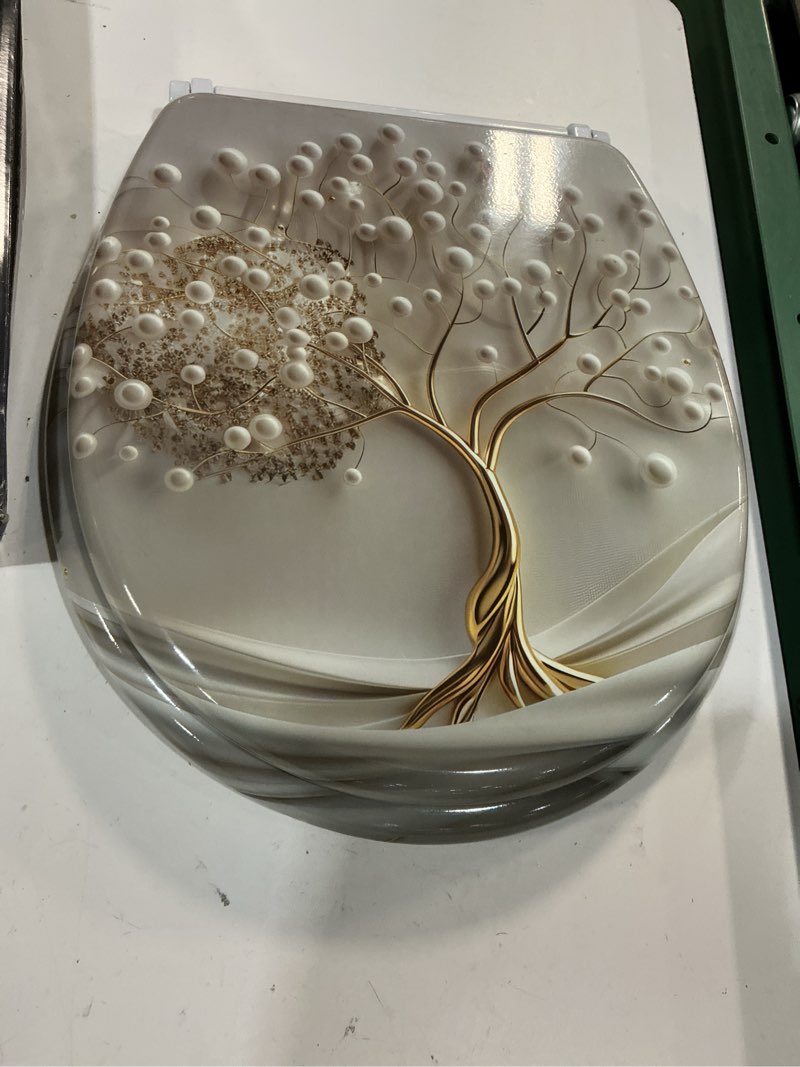 Condition photo showing Good Condition for sanilo soft close toilet seat with quick release, toilet lid detachable at the press of a button, easy installation from above (tree of life)