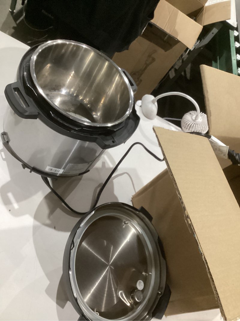 Condition photo showing As Is for instant pot duo 7-in-1 electric pressure cooker, slow cooker, rice, steamer, sauté, yogurt maker, warmer & sterilizer, includes app with over 800 recipes, stainless steel, 6 quart 6 quarts