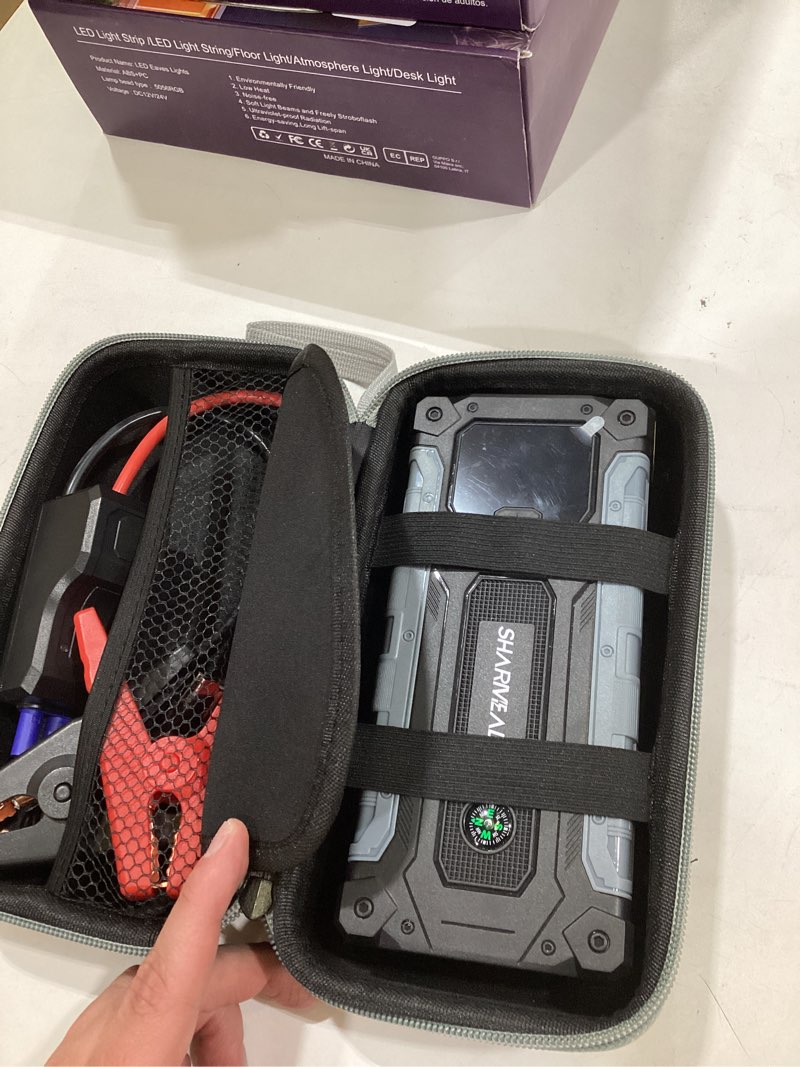 Condition photo showing Good Condition for sharmeal car battery jump starter 6000a, jump starter battery pack for all gas and 10.0l diesel, 12v portable jump box with led light 6000a+charging cable+charger block