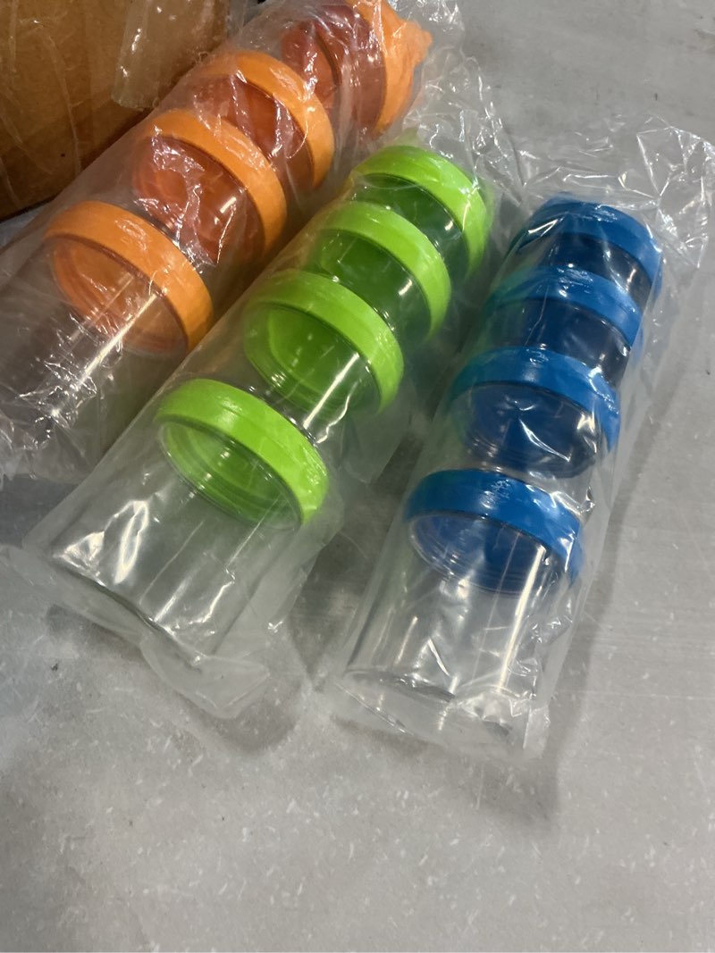 Condition photo showing As Is for test seleware portable stackable food storage containers for snacks formula powder and drinks twist lock system airtight leak-proof bpa and phthalate free blue green and orange blue & green & orange