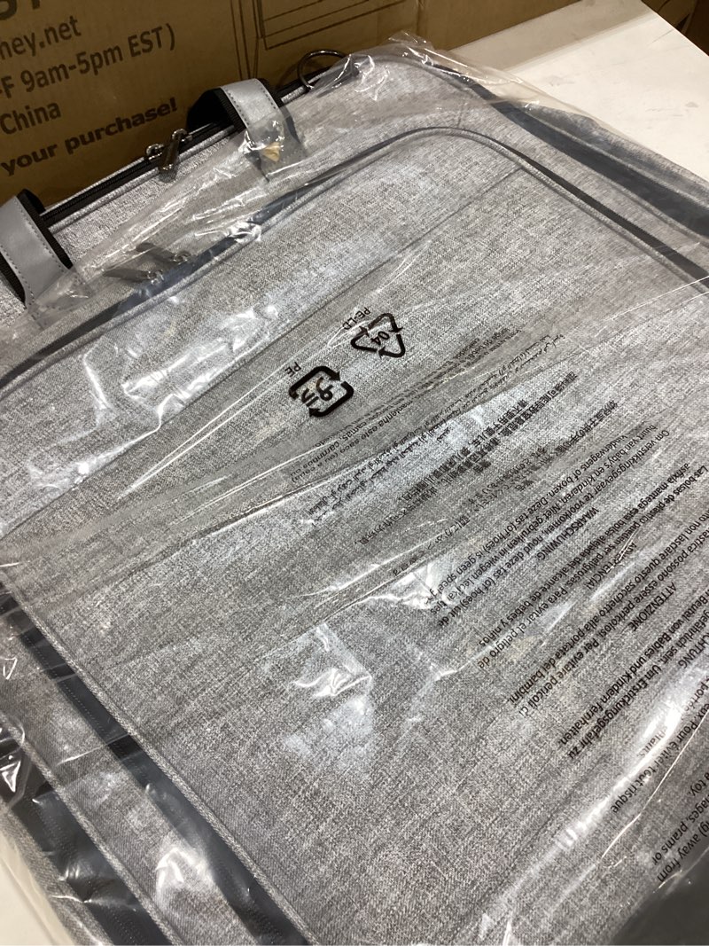 Condition photo showing Good Condition for Amazon Basics 43\" Premium Garment Bag for Travel, Suit Bag with Shoulder Strap for Suits and Dresses, 1680D Polyester Fabric, Exterior/Interior Pockets, Leather-reinforced Corners, Trifold, 