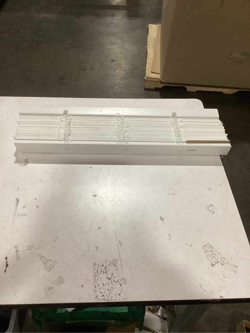 Condition photo showing Good Condition for Levolor faux wood blind or a similar Venetian blind product featuring 2-inch slats and a cordless design. 
