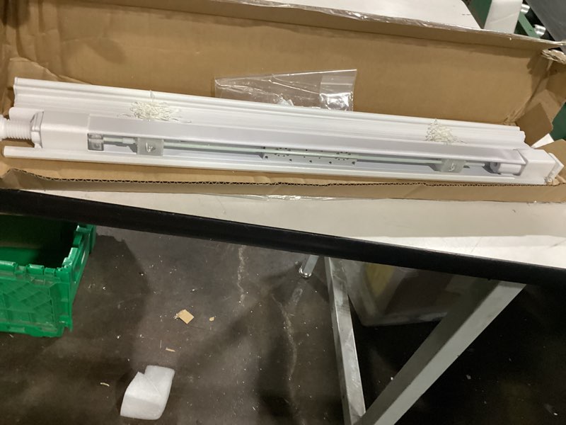 Condition photo showing New/Like New for 24”x64” white mini blind