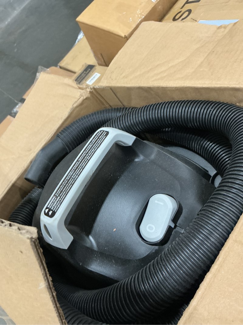 Condition photo showing As Is for amazon basics 4 gallon, 3 hp stainless steel wet/dry vacuum, grey/black