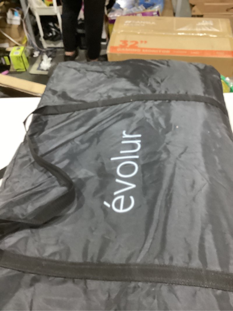 Condition photo showing New/Like New for évolur Lullaby Portable Bassinet with Wheels, Adjustable Bedside Sleeper, Breathable Mesh Sides, Large Storage Basket, Easy Fold, and Travel Bag Included, Perfect for Newborns & Infants - Biege