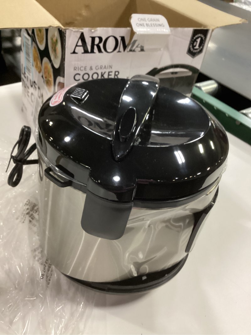 Condition photo showing As Is for AROMA Digital Rice Cooker, 4-Cup (Uncooked) / 8-Cup (Cooked), Steamer, Grain Cooker, Multicooker, 2 Qt, Stainless Steel Exterior, ARC-914SBD 4 Cup Uncooked / 8 Cup Cooked