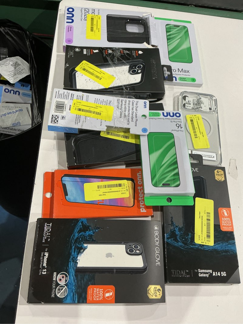 Condition photo showing As Is for assorted cellphone/tablet/laptop case covers & accessories