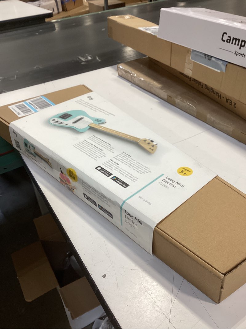 Condition photo showing New/Like New for Loog Mini Electric kids Guitar for Beginners built-in Amp Ages 3+ Learning App and Lessons Included Green