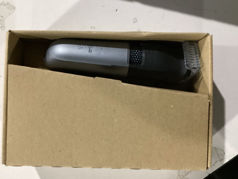 Condition photo showing New/Like New for norelco philips beard trimmer 7000 series, 100% waterproof trimmer for men, 40 lock-in hair length settings, beardsense power adaptability, detail & t-blade trimmer heads, charging stand, bt7670/40 bt7670/40 + 11 accessories black