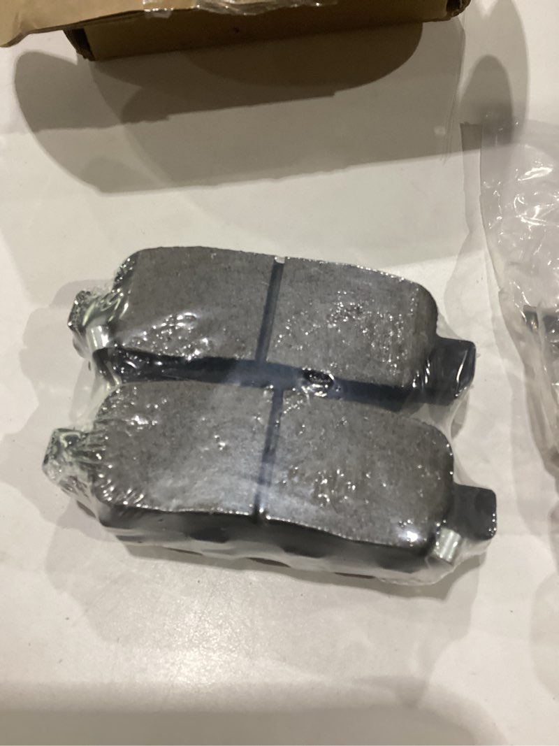 Condition photo showing New/Like New for break pads unknown make and model