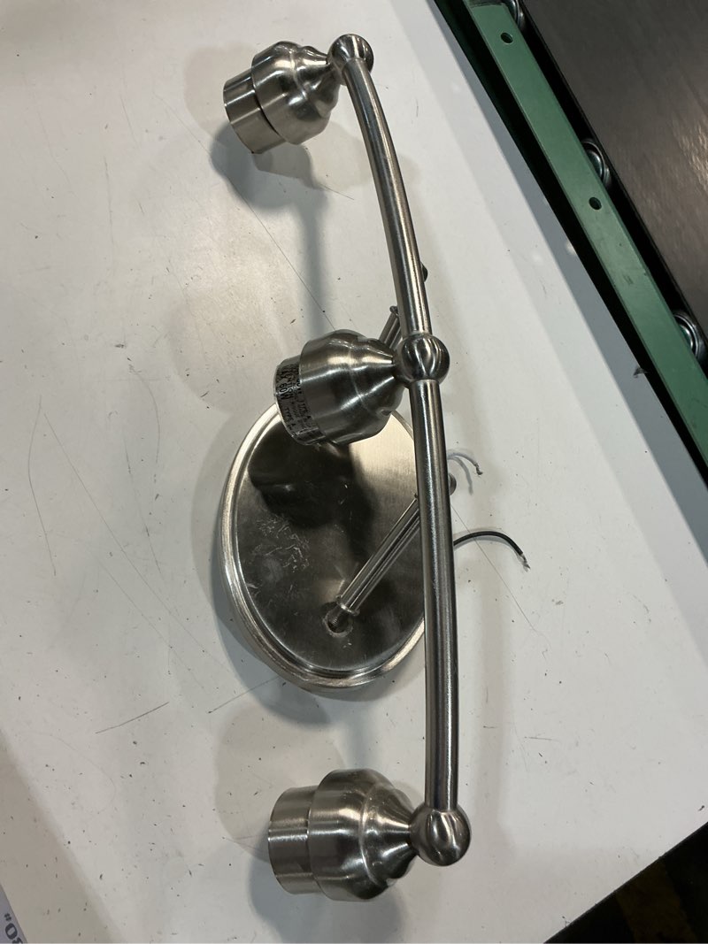 Condition photo showing As Is for style selections mix and match 5.5 in x 20 in x 7 in 3 -light brushed nickel transitional vanity light fitte
