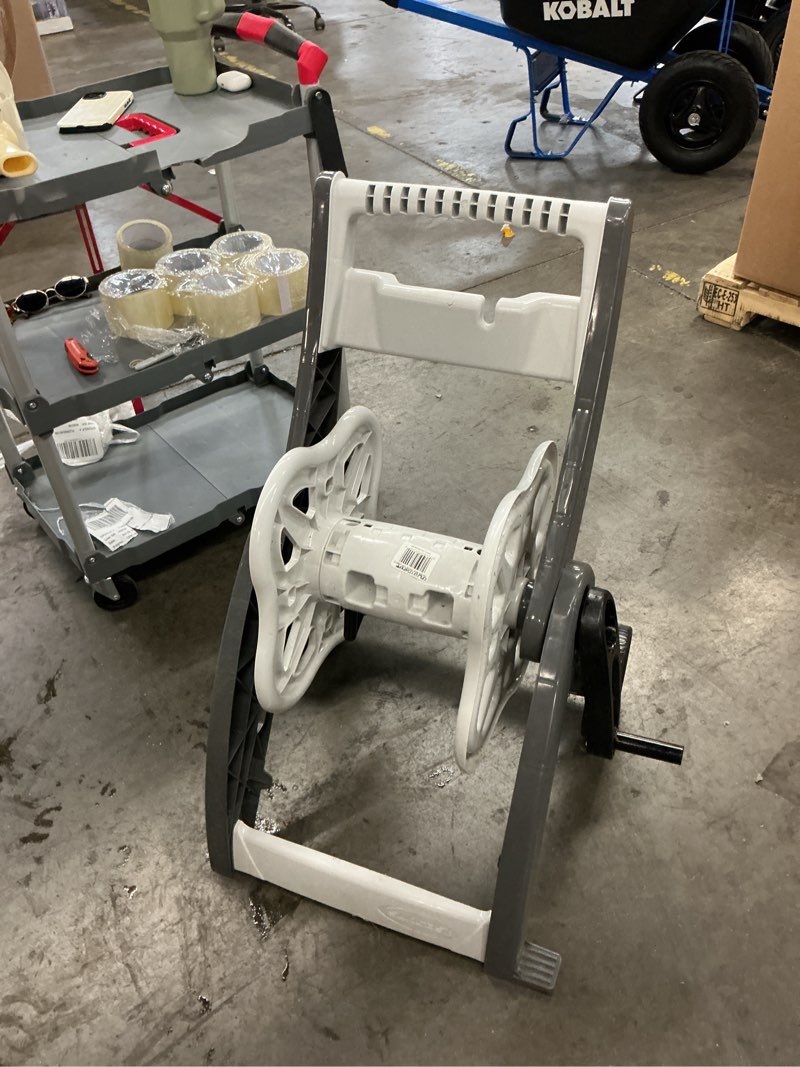Condition photo showing As Is for suncast plastic 175-ft cart hose reel