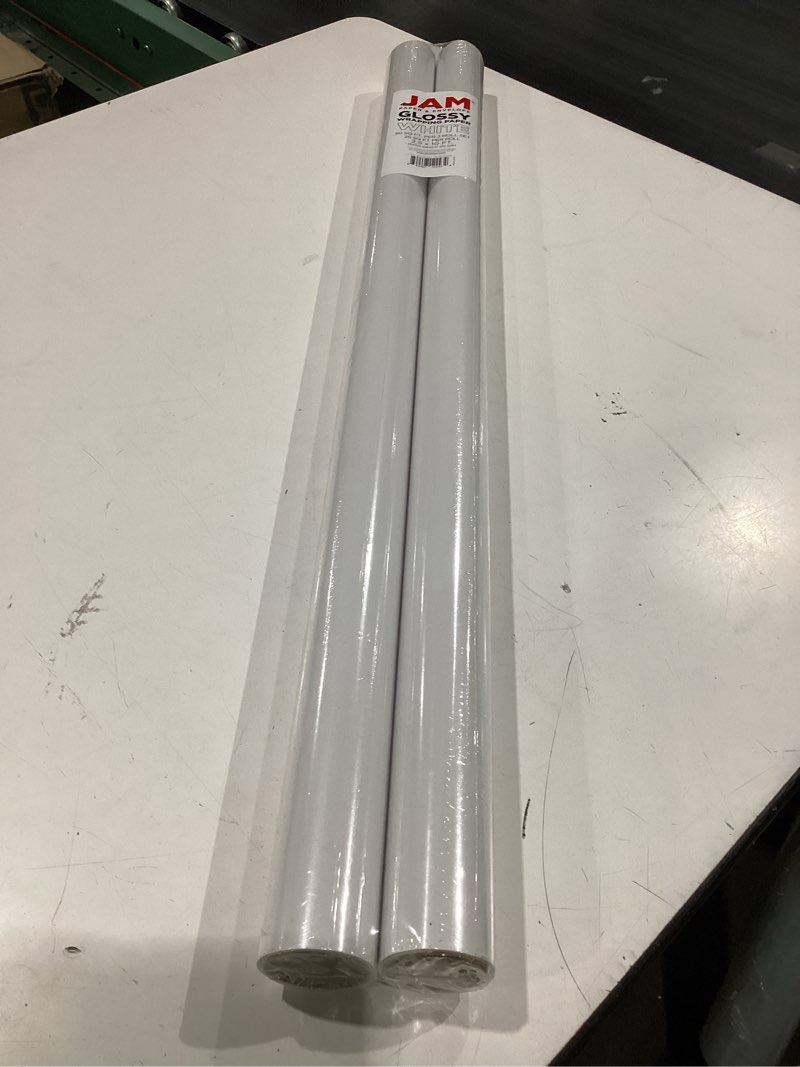 Condition photo showing New/Like New for jam paper gift wrap - glossy wrapping paper - 50 sq ft total (30 in x 10 ft each) - white - 2 rolls/pack 1 roll (pack of 2) white