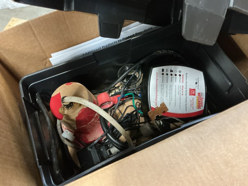 Condition photo showing As Is for the basement watchdog 1/4 hp 2,000 gph thermoplastic dual reed switch battery backup sump pump