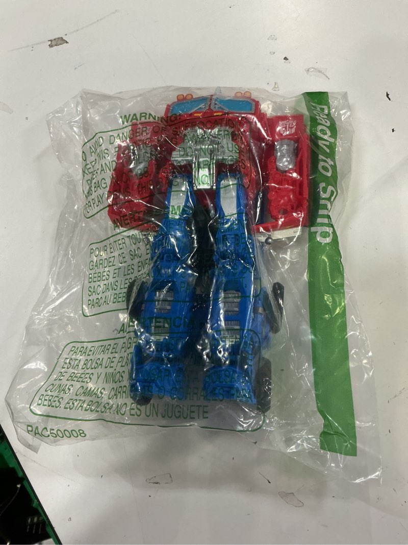Condition photo showing Good Condition for transformers smash changers optimus prime action figure, changes from robot toy to truck toy, ages 6+