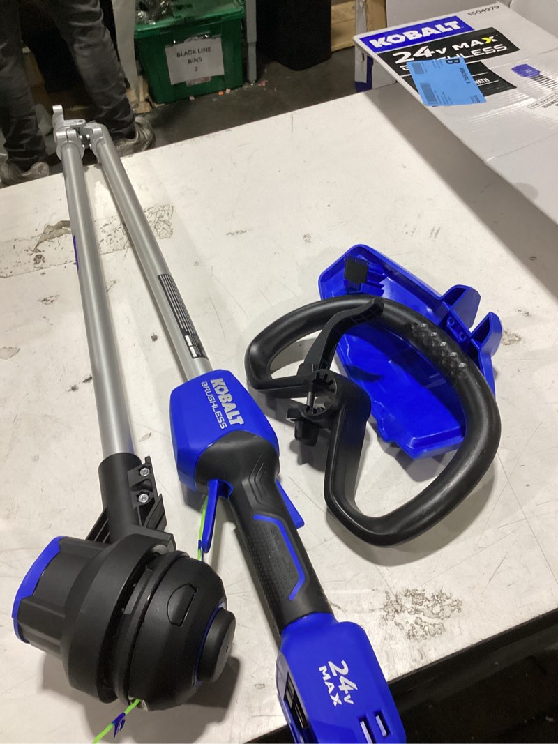 Condition photo showing As Is for kobalt 24-volt 12-in straight shaft battery string trimmer (battery and charger not included)
