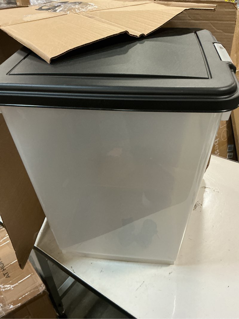 Condition photo showing Good Condition for IRIS USA Dog Food Storage Container, Up to 50 Pounds, Attachable Wheels, For Dog Cat Bird and Other Pet Food Storage Bin, Keep Fresh, Easy Mobility - Made in USA, Black 54 lbs Black