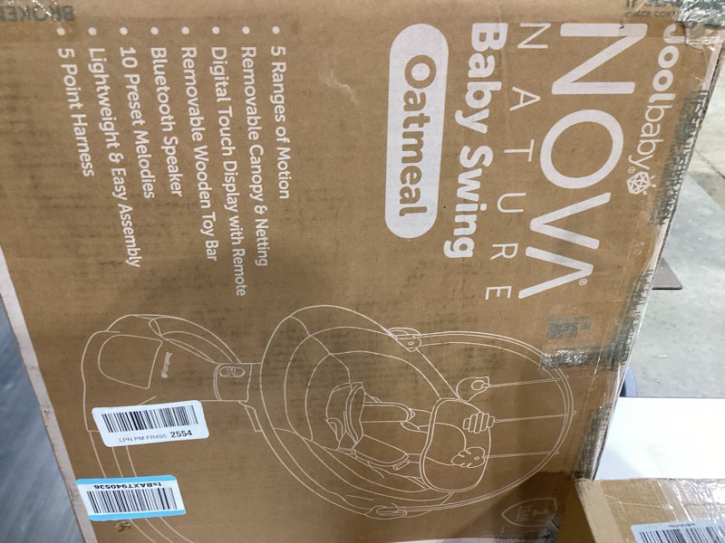 Condition photo showing New/Like New for jool baby nova nature baby swing for newborns with natural wood toys, electric motorized infant swing, bluetooth music, remote (oatmeal)