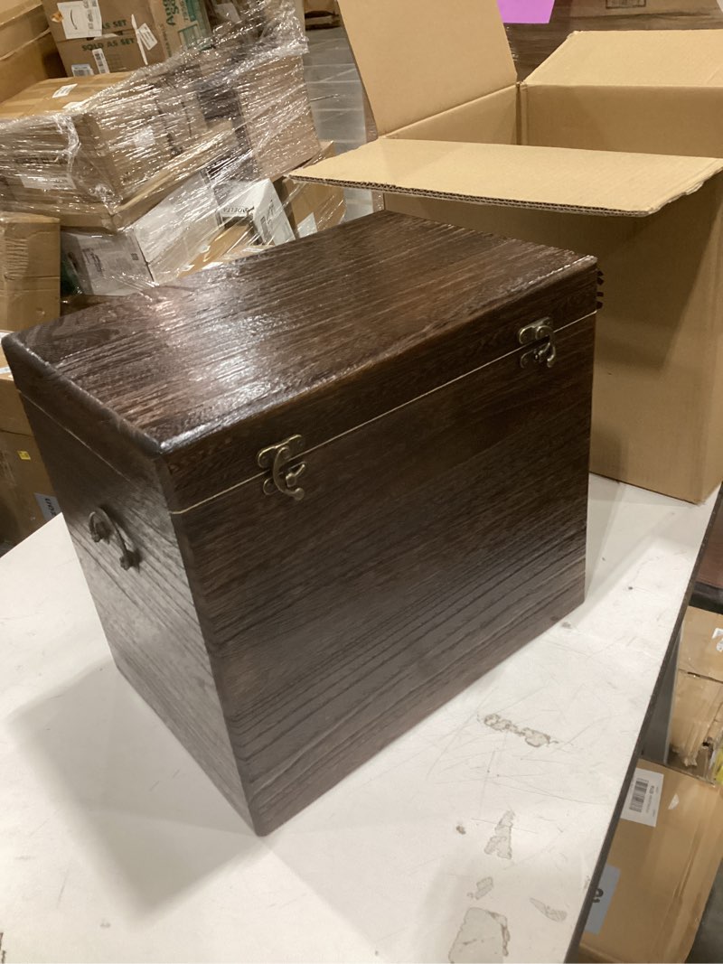Condition photo showing Good Condition for this storage chest is likely part of the pottery barn emmett collection, featuring a dark wood finish and rustic metal hardware.