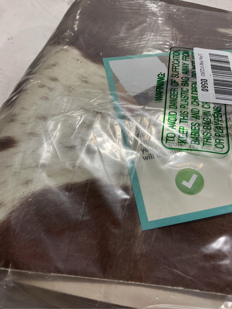 Condition photo showing Good Condition for easycozy faux cowhide cow print rug: 6.2 x 7 western decor faux cowhide, thickened cow print for bedroom, living room, home office decor floral brown 7' x 6'3" (irregular)