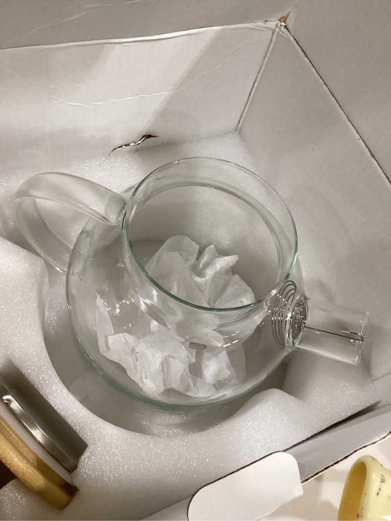 Condition photo showing New/Like New for high borosilicate heat-resistant glass teapot, can be used for boiling water and ice water, can be used for holding beverages, juices, and brewing tea. the pot body is marked with a scale tableware