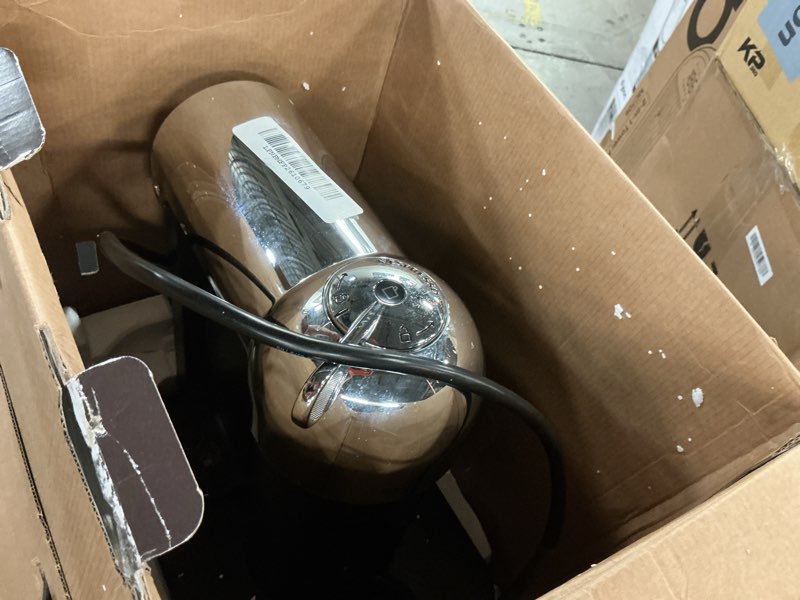 Condition photo showing item condition for Nespresso Vertuo Coffee and Espresso Maker by Breville, Chrome Machine Chrome