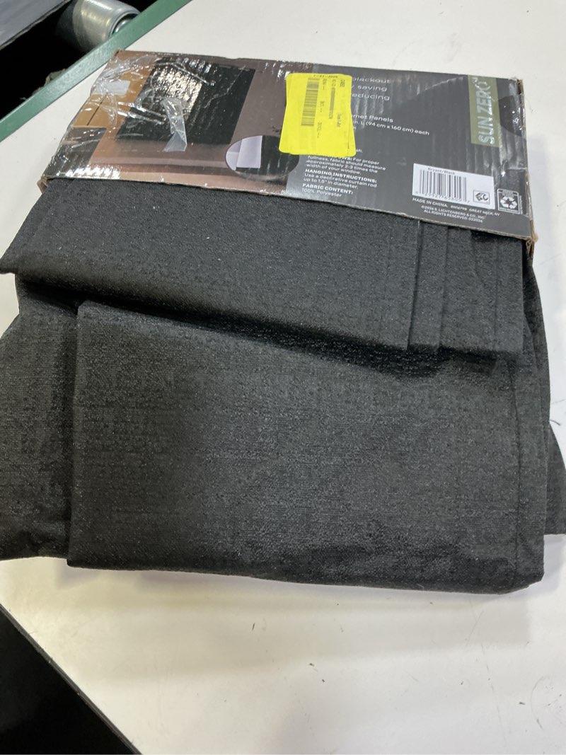 Condition photo showing Good Condition for sun zero bryant 2-piece textured thermal insulated 100% blackout grommet top curtain panel  black  37”w x 63 l