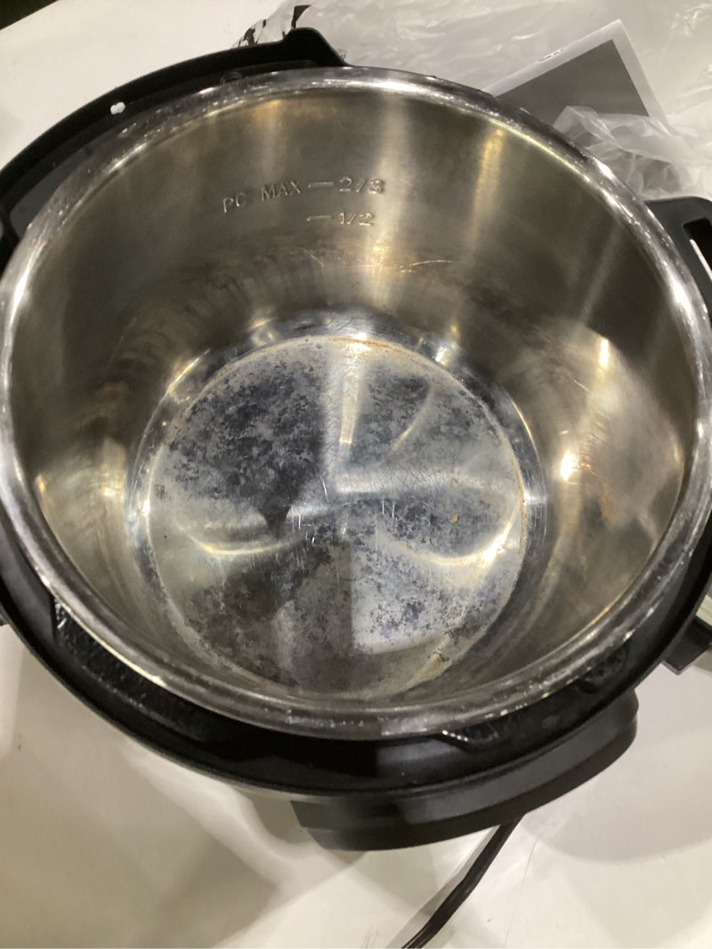 Condition photo showing As Is for (used, not tested)instant pot duo 7-in-1 electric pressure cooker, slow cooker, rice cooker, steamer, sauté, yogurt maker, warmer & sterilizer, includes app with over 800 recipes, stainless steel, 8 quart