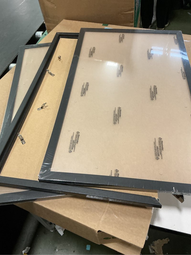 Condition photo showing As Is for upsimples 16x24 Picture Frame Gold 3 Pack, Scratch-Proof Poster Frames 16 x 24 for Photo Gallery - Slide-In Strips, Horizontal or Vertical Wall Mounting Gold 16x24