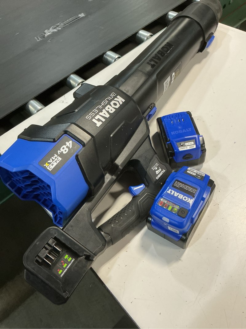 Condition photo showing As Is for kobalt 48v max (24vx2) 600 cfm / 150 mph handheld leaf blower kit, (2) 4.0ah batteries and charger included