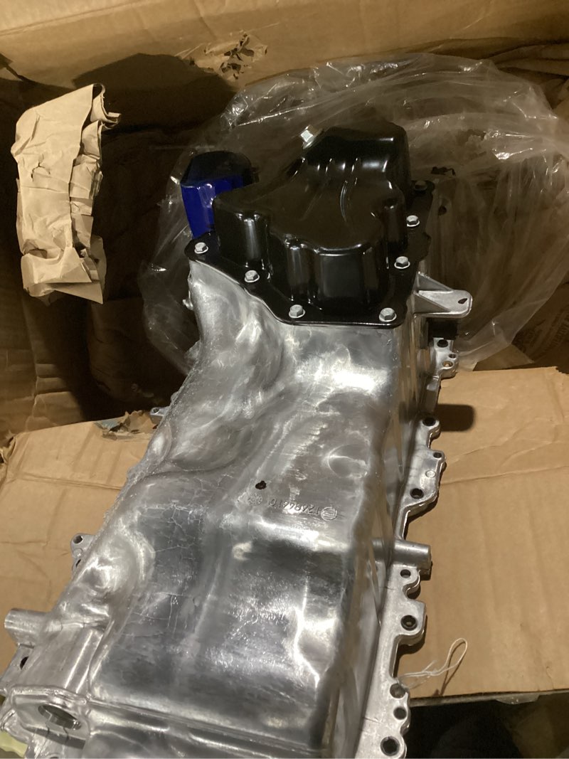 Condition photo showing As Is for similar  to photo gm genuine parts 12640746 engine oil pan