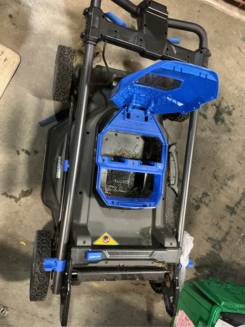 Condition photo showing As Is for kobalt 48v max (24vx2) 21-in push mower kit, (2) 5.0ah batteries and charger included