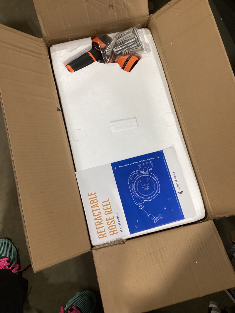 Condition photo showing New/Like New for giraffe tools retractable garden hose reel 1/2 inch x 130 ft, super heavy duty, any length lock, slow return system, wall mounted and 180 deg swivel bracket 1/ 2"130 ft