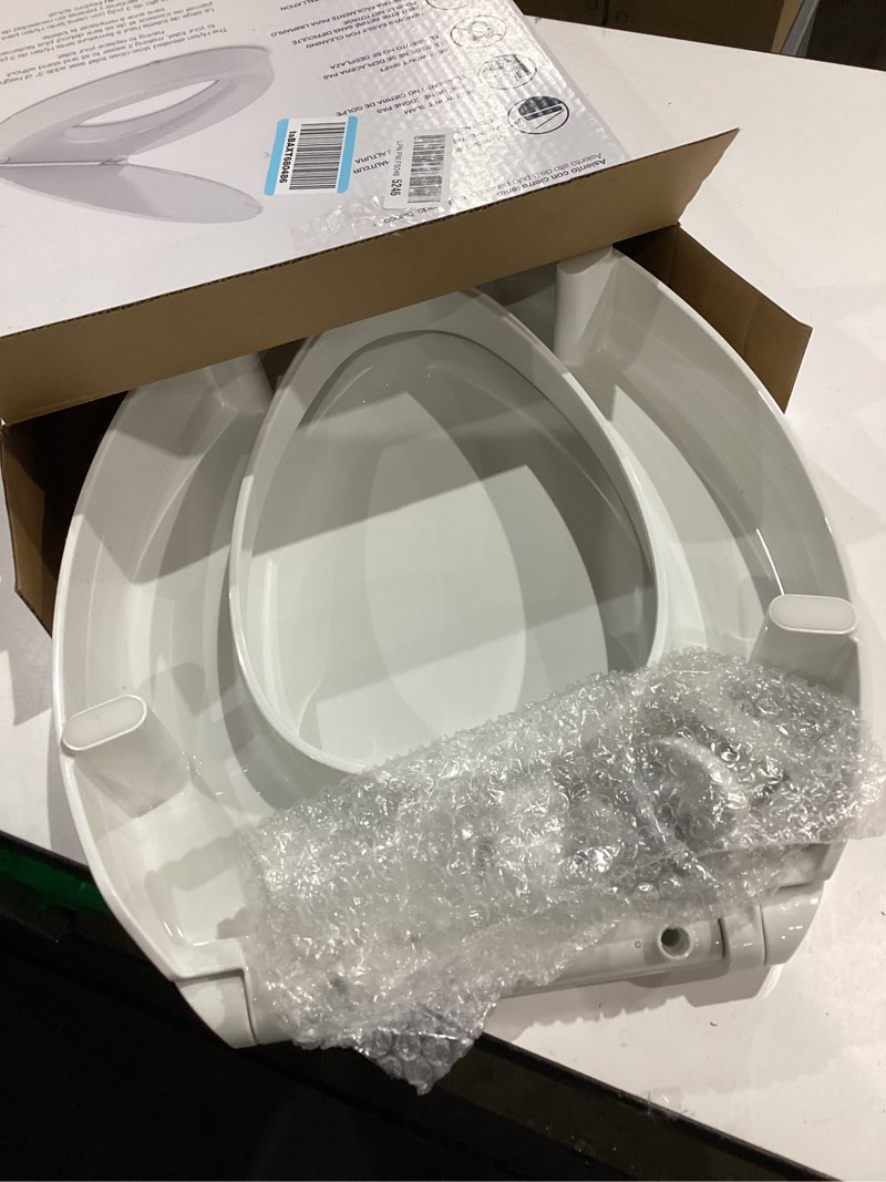 Condition photo showing As Is for kohler 25875-0 hyten 3" height, elevated soft close elongated toilet seat, contoured seat with grip-tight bumpers, quick-attach hardware, no slam toilet seat, white white elongated