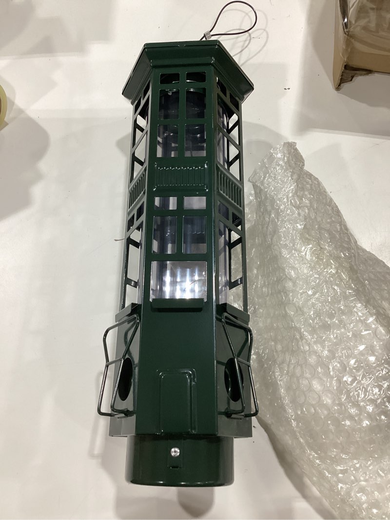 Condition photo showing Good Condition for squirrel proof bird feeder for outdoors, chew-proof & weather resistant, 3 port, gravity spring hanging metal bird feeder, 3lb large capacity, attract wild birds green