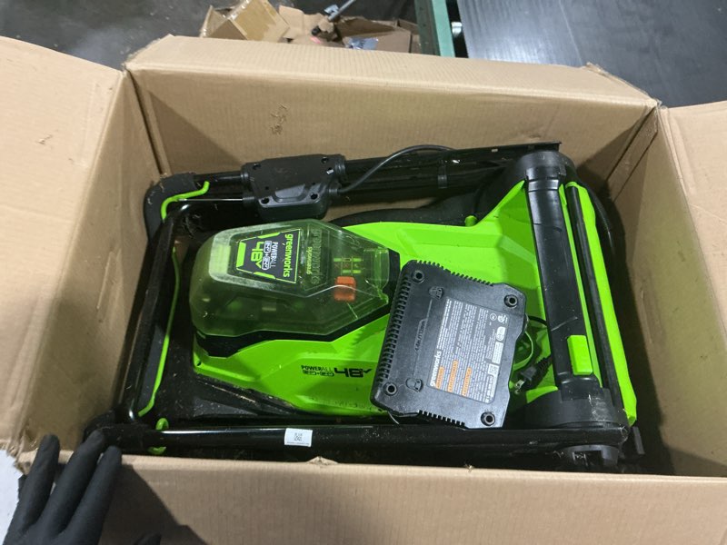 Condition photo showing As Is for greenworks 48v 17 in push lawn mower, (2) 4.0 ah batteries, charger 17" (2 x 4.0ah)