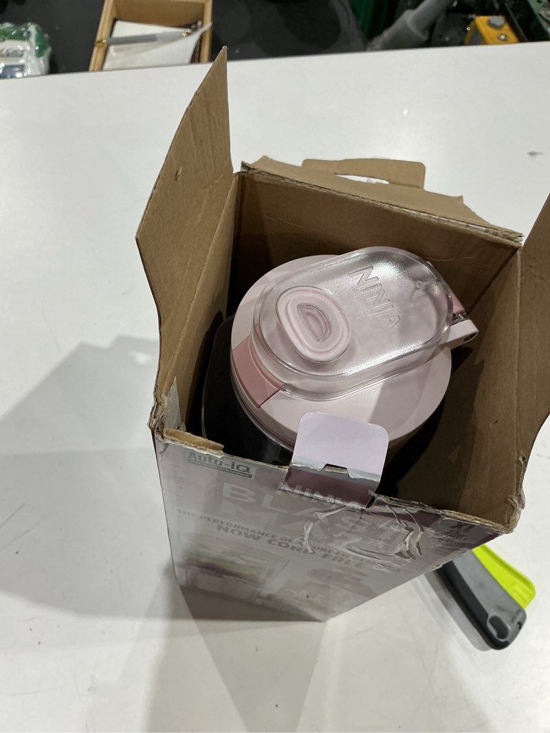 Condition photo showing As Is for ninja blast max, portable blender + twist & go, personal smoothie, blend, ice crush, 3 programs, cordless, 22 oz removable vessel, dishwasher safe, leakproof, pink, bc251pk pink 22 oz.
