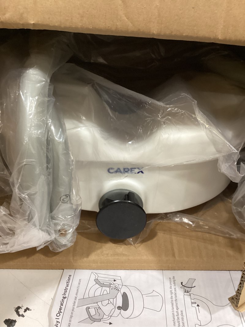 Condition photo showing Good Condition for carex e-z lock raised toilet seat with handles, 4.5 inch toilet seat riser with arms, toilet riser fits most toilets, elongated or round, toilet seat lifter, white