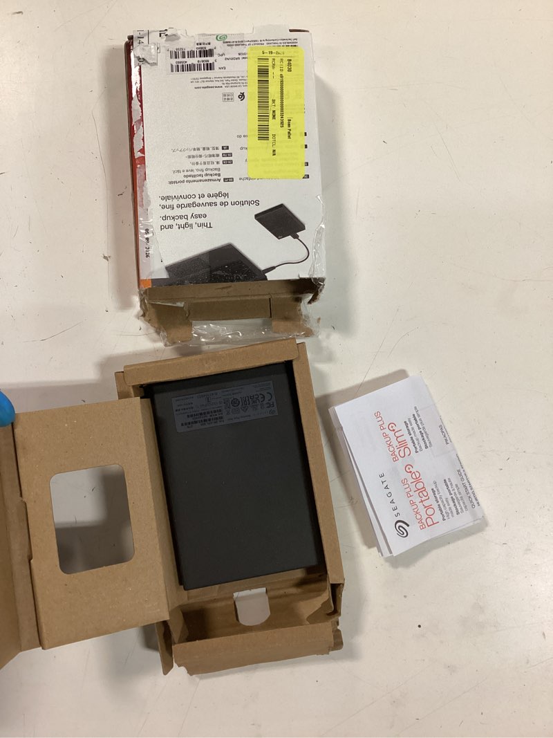 Condition photo showing As Is for seagate 2tb backup plus slim portable external hard drive usb 3.0, black, sthn2000400