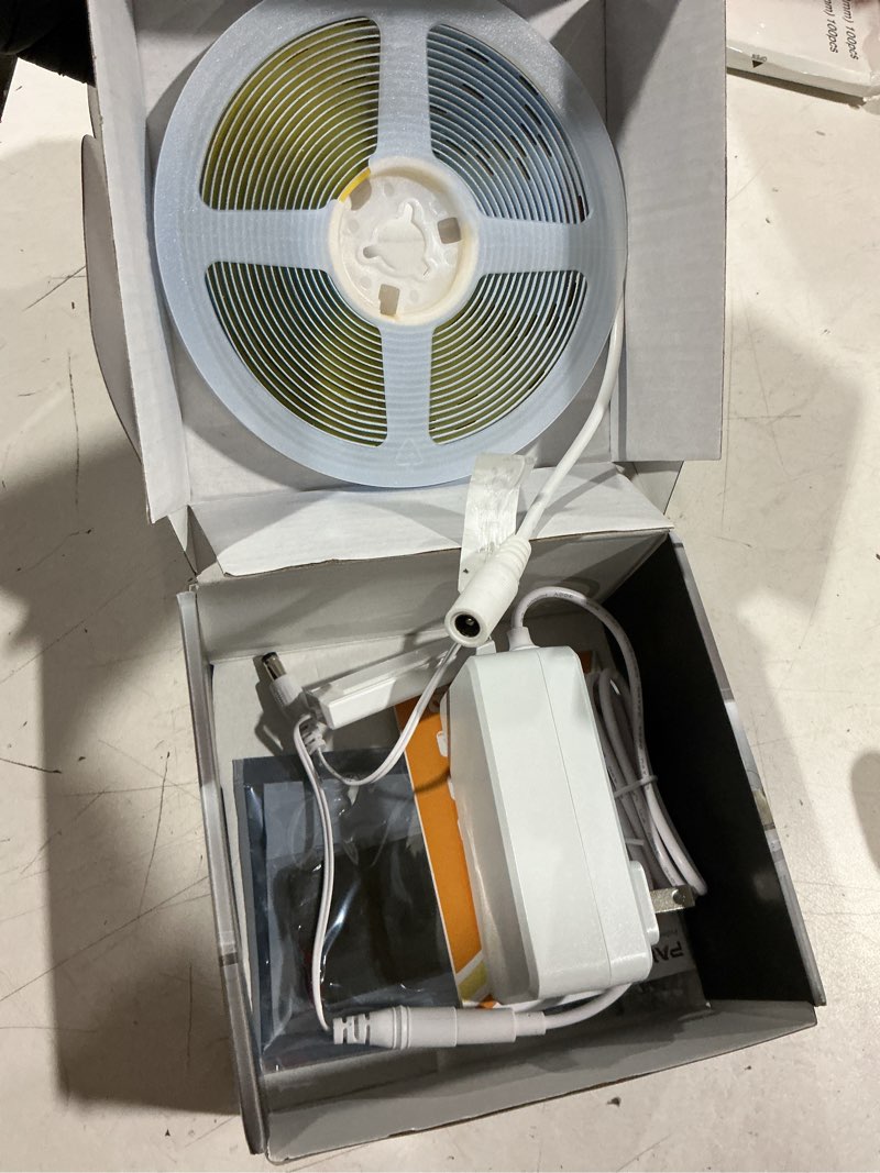 Condition photo showing As Is for pautix cob led strip light,strip lights with rf remote,ul listed daylight white natural white 6000k 16.4ft super bright dimmable 24v flexible led tape lights,cabinets kitchen mirror office lighting 6000k-16.4ft/5m