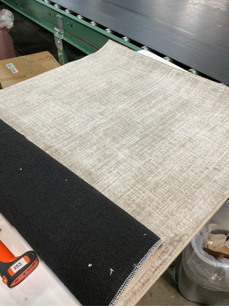 Condition photo showing As Is for (unknown size)safavieh mirage collection area rug - 3' x 5', beige, solid design, handmade wool & viscose, ideal for the living room, bedroom, dining room (mir731b-3) 3' x 5' (rectangular) beige