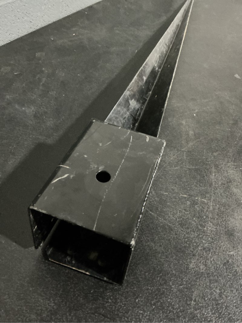 Condition photo showing As Is for spike 34.88-in x 34.88-in powder coating, black steel post spike for wood