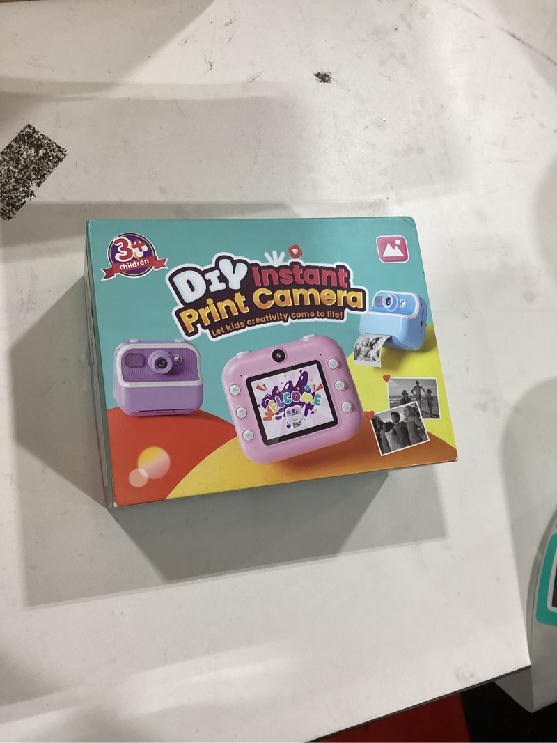 Condition photo showing Good Condition for Instant Camera, Front Rear Dual Selfie Kids Camera with 1080P Videos, Holiday Birthday Gifts for Kids Age 3-12, Toddler Portable Travel Print Digital Camera Toy for 4 5 6 7 8 9 Year Boys Girls Purple