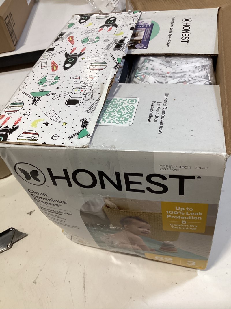 Condition photo showing New/Like New for the honest company comfort dry diapers, hypoallergenic, fragrance-free, sensitive skin, space travel + it's a pawty, club box size 3 (16–28 lbs), 62 count size 3 (62 count) space travel + it's a pawty