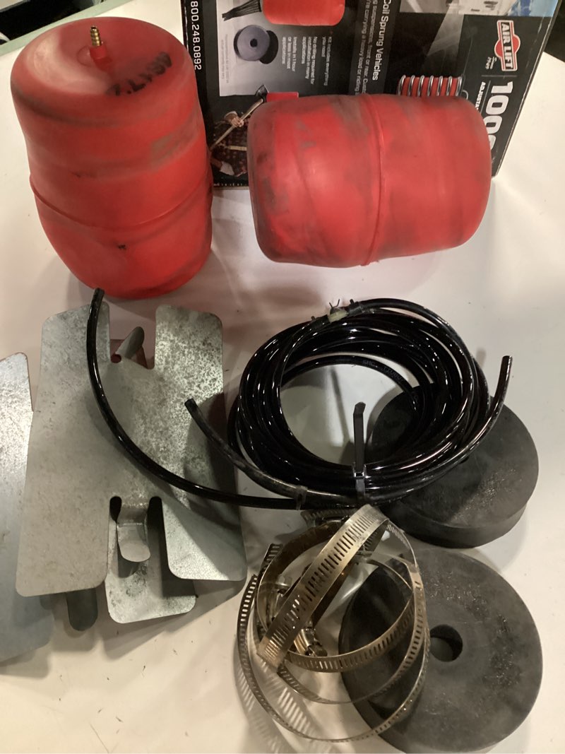 Condition photo showing As Is for air lift 1000 air suspension kit 60817