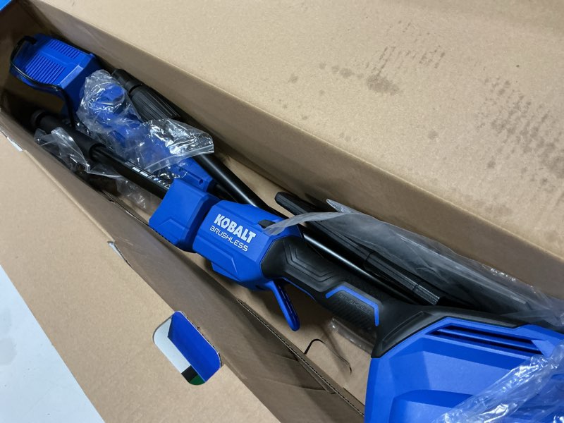 Condition photo showing As Is for kobalt gen4 40-volt 10-in 2 ah battery pole saw (battery and charger included)