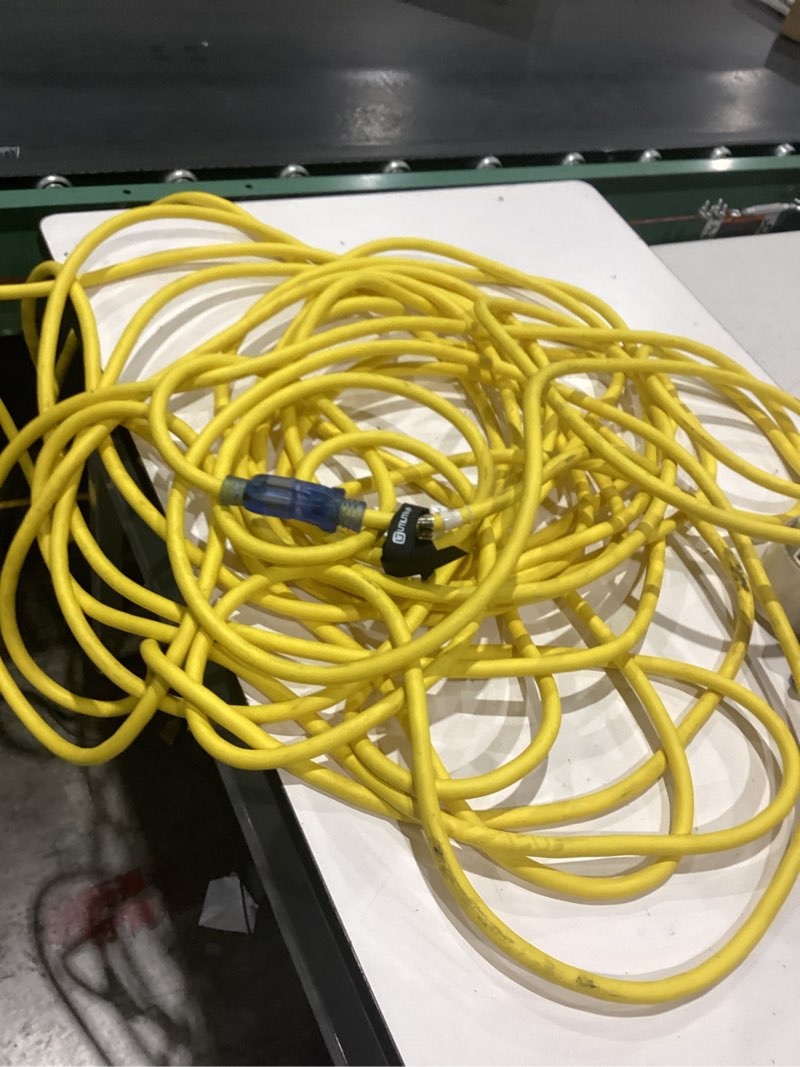 Condition photo showing As Is for yellow jacket 50-ft 14 / 3 heavy duty 3 prong yellow outdoor extension power cord